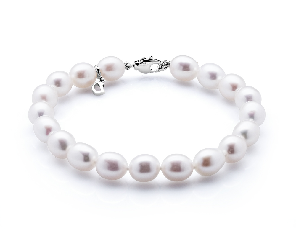 Браслет из белого рисообразного жемчуга 7-7,5 мм. Качество жемчуга наивысшее ААА. Артикул 7325