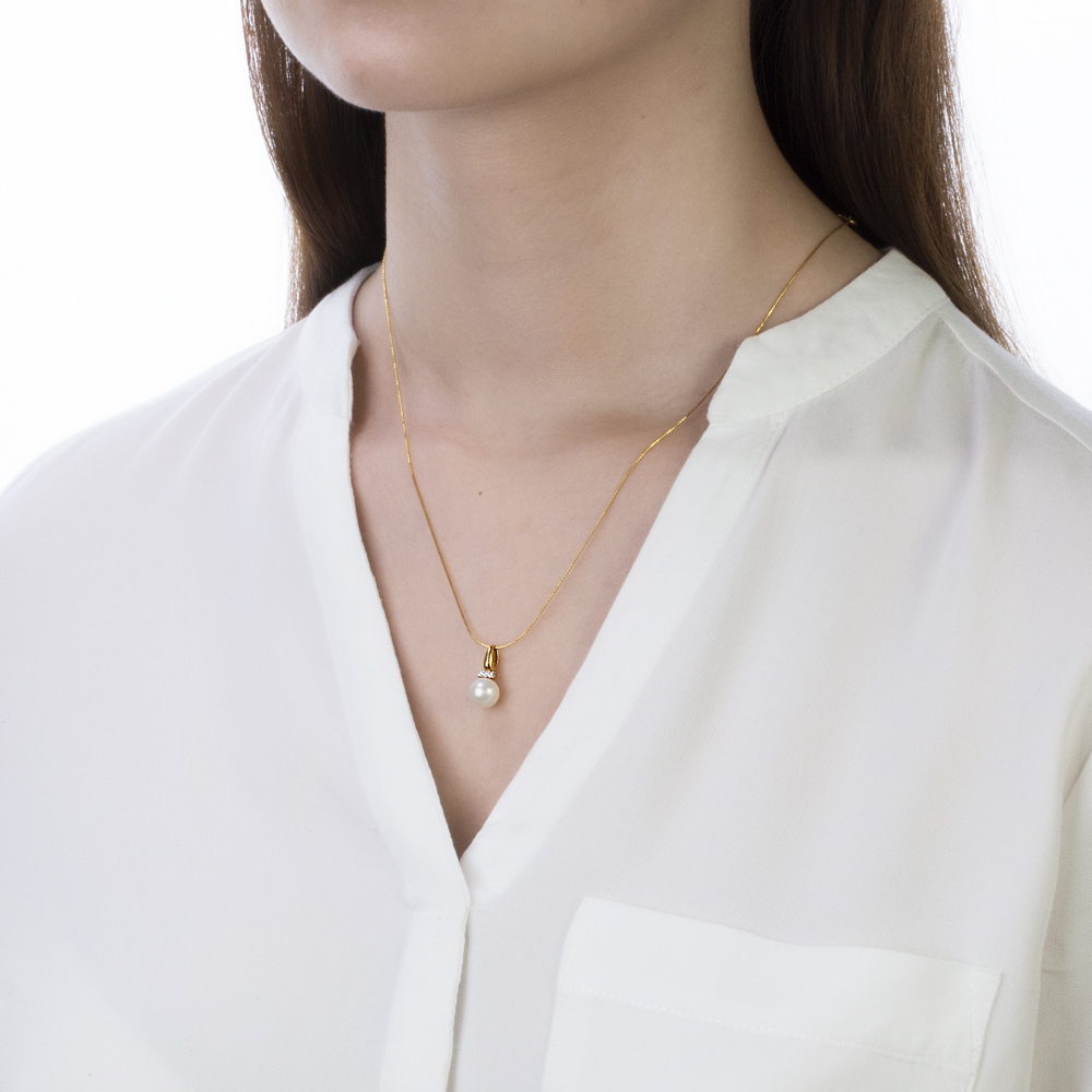 Кулон из желтого золота с белой жемчужиной 7,5-8 мм. Артикул 12042 Кулон из желтого золота с белой жемчужиной 7,5-8 мм. Артикул 12042