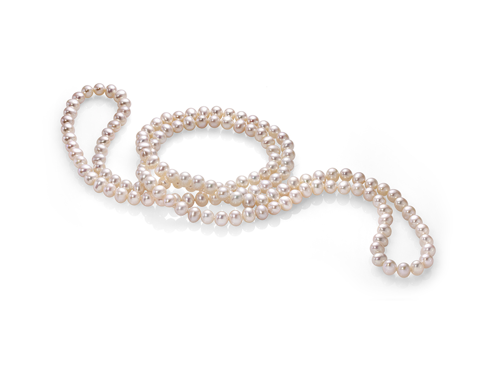 Бусы из белого овального жемчуга 7,5-8 мм. Качество жемчуга наивысшее ААА. Артикул 9680